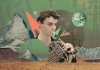 A boy playing the french horn against a composite background of mountains, desert and planets. A boy playing the french horn against a composite background of mountains, desert and planets.