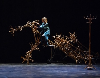 Aurélia Thierrée rides a huge horse made out of hat racks Aurélia Thierrée rides a huge horse made out of hat racks