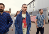 The four members of Bastille walk across an industrial estate towards the camera The four members of Bastille walk across an industrial estate towards the camera