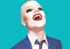 Jamie's head and shoulders, smiling with his eyes closed, wearing school uniform and makeup Jamie's head and shoulders, smiling with his eyes closed, wearing school uniform and makeup
