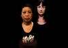 A photo of two women, both wearing black, looking directly at the camera with sorrowed expressions A photo of two women, both wearing black, looking directly at the camera with sorrowed expressions