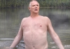 Greg Davies walking through a lake Greg Davies walking through a lake