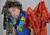 Comedian Milton Jones hung up on a washing line with pegs Comedian Milton Jones hung up on a washing line with pegs