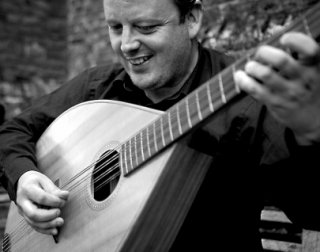 Matthew Forbes playing the ukulele Matthew Forbes playing the ukulele