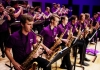 Big Band - group of saxophonists playing the saxophone Big Band - group of saxophonists playing the saxophone
