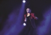 Lulu singing on stage wearing a red jacket Lulu singing on stage wearing a red jacket