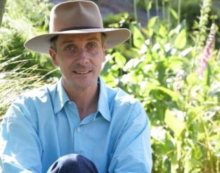 Landscape contractor James Alexander-Sinclair surrounded by plants Landscape contractor James Alexander-Sinclair surrounded by plants