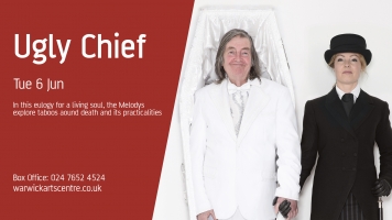 Victoria Melody as funeral director, Mike Melody in a white coffin Victoria Melody as funeral director, Mike Melody in a white coffin