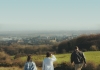 Rita, Sue and Bob Too - actors walking on a hill towards an industrial town Rita, Sue and Bob Too - actors walking on a hill towards an industrial town