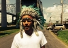 Actor Stephen Dorff looks off camera wearing a Native American headress. Actor Stephen Dorff looks off camera wearing a Native American headress.