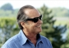 Jack Nicholson in a blue shirt an black sunglasses, on an outdoor background Jack Nicholson in a blue shirt an black sunglasses, on an outdoor background