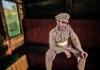 A soldier sitting on a train bench A soldier sitting on a train bench