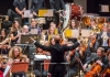 Close up of conductor Paul McGrath in front of a student orchestra in the Butterworth Hall Close up of conductor Paul McGrath in front of a student orchestra in the Butterworth Hall