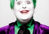 Comedian Justin Moorhouse dressed as the joker with green hair, white paint on his face, red lipstiick and a purple suit Comedian Justin Moorhouse dressed as the joker with green hair, white paint on his face, red lipstiick and a purple suit