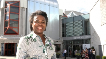 Doreen Foster standing outside Warwick Arts Centre in the sun Doreen Foster standing outside Warwick Arts Centre in the sun