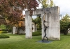 Barry Flanagan’s 2004 sculpture, Acrobats, showing two hares playing, in front of a stone archway and a tree in autumn. Barry Flanagan’s 2004 sculpture, Acrobats, showing two hares playing, in front of a stone archway and a tree in autumn.